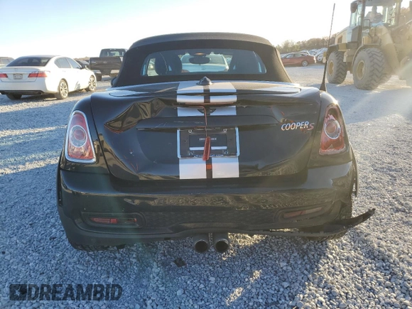 2012 MINI Roadster S z VIN WMWSY3C51CT565240, wystawiony jako Copart lot #83651954 z przebiegiem 172 954 mil mil oraz Szkody całkowita. Historia ofert i sprzedaży dostępna na DreamBid. Obrazek 6.
