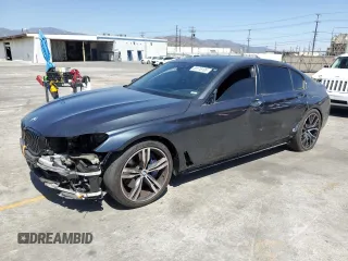 2018 BMW 7 Series 740i with VIN WBA7E2C59JG741854, listed as a Copart auction lot 59118105 with 69,254 mi miles and Salvage title. Bid and sale history available at DreamBid. Image 1.