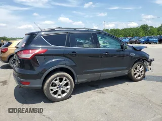 2013 Ford Escape SEL z VIN 1FMCU9HX1DUC17266, wystawiony jako Copart lot #63678025 z przebiegiem 196 206 mil mil oraz Szkoda całkowita • Salvage title. Historia ofert i sprzedaży dostępna na DreamBid. Obrazek 3.