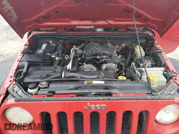 2012 Jeep Wrangler Unlimited Sport z VIN 1C4BJWDG0CL272440, wystawiony jako Copart lot #56044005 z przebiegiem 143 117 mil mil oraz Szkoda całkowita • Salvage title. Historia ofert i sprzedaży dostępna na DreamBid. Obrazek 12.