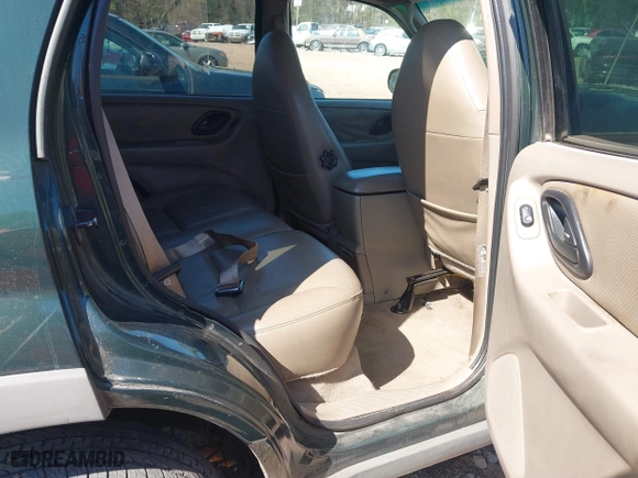 2001 Ford Escape XLT with VIN 1FMCU03121KF56950, listed as a IAAI auction lot 41768628 with 265,069 mi miles. Bid and sale history available at carsss.com. Image 8.
