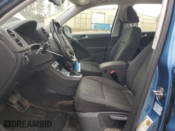 2017 Volkswagen Tiguan S with VIN WVGBV7AX2HK046312, listed as a Copart auction lot 42393295 with 94,814 mi miles and Salvage Title. Bid and sale history available at DreamBid. Image 7.