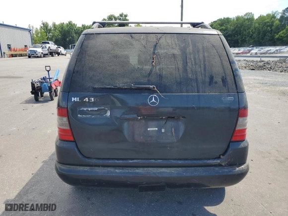 1999 Mercedes-Benz M-Class with VIN 4JGAB72E7XA107952, listed as a Copart auction lot 58559244 with 175,236 mi miles and Non Repairable. Bid and sale history available at carsss.com. Image 6.