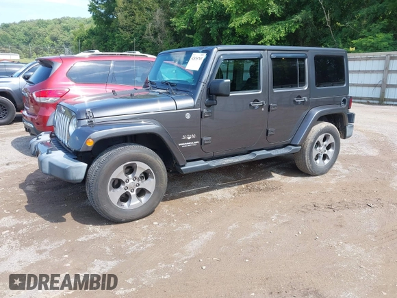 2016 Jeep Wrangler Unlimited Sahara with VIN 1C4BJWEG7GL340074, listed as a IAAI auction lot 42434763 with 81,095 mi miles and . Bid and sale history available at DreamBid. Image 2.