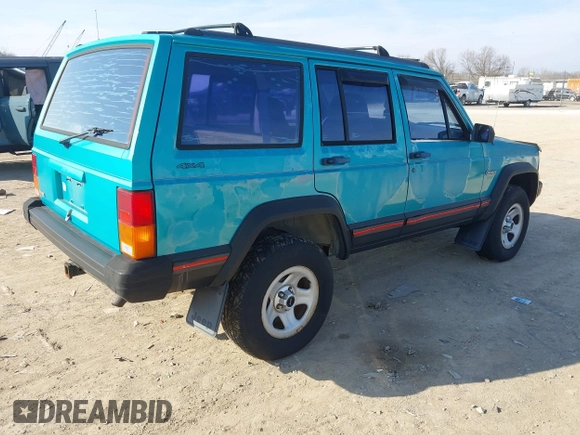 1996 Jeep Cherokee Sport z VIN 1J4FJ68S2TL103997, wystawiony jako IAAI lot #41517835 z przebiegiem 175 560 mil mil oraz . Historia ofert i sprzedaży dostępna na DreamBid. Obrazek 4.