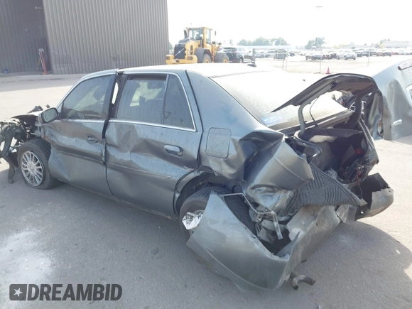 2004 Cadillac DeVille DHS z VIN 1G6KE57Y74U119605, wystawiony jako IAAI lot #40555057 z przebiegiem Nie podano mil oraz . Historia ofert i sprzedaży dostępna na DreamBid. Obrazek 3.