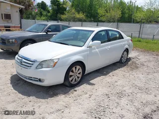 2005 Toyota Avalon XL with VIN 4T1BK36B65U045629, listed as a IAAI auction lot 42093132 with 133,157 mi miles. Bid and sale history available at carsss.com. Image 2.