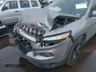 2018 Jeep Cherokee Latitude with VIN 1C4PJMCX4JD548136, listed as a IAAI auction lot 41592821 with 165,022 mi miles and . Bid and sale history available at DreamBid. Image 6.