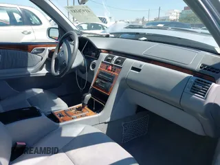 2002 Mercedes-Benz E-Class with VIN WDBJF65J32B485084, listed as a IAAI auction lot 41976183 with 1 mi miles. Bid and sale history available at carsss.com. Image 5.