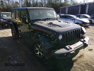 2021 Jeep Wrangler Unlimited Rubicon with VIN 1C4HJXFGXMW580776, listed as a Copart auction lot 46478105 with 56,120 mi miles and Salvage Title. Bid and sale history available at DreamBid. Image 11.