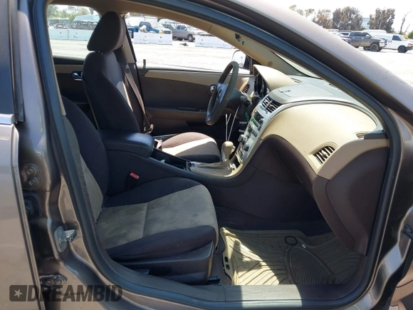 2012 Chevrolet Malibu 1LS with VIN 1G1ZB5E00CF189945, listed as a IAAI auction lot 42096499 with 121,370 mi miles and . Bid and sale history available at DreamBid. Image 5.