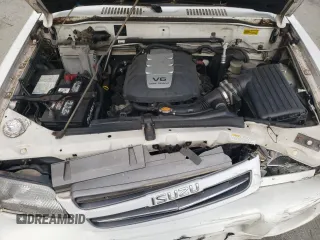 2000 Isuzu Trooper S with VIN JACDJ58X6Y7J06807, listed as a Copart auction lot 79179454 with 157,308 mi miles and Salvage title. Bid and sale history available at DreamBid. Image 12.