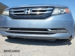 2014 Honda Odyssey EX-L with VIN 5FNRL5H65EB103900, listed as a IAAI auction lot 42592359 with 53,276 mi miles and . Bid and sale history available at DreamBid. Image 6.