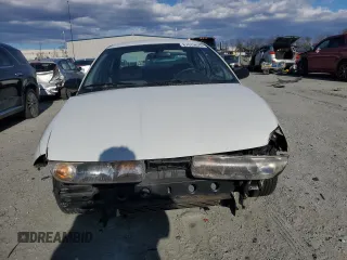 1996 Saturn SL with VIN 1G8ZK5279TZ162812, listed as a Copart auction lot 87079874 with 143,461 mi miles and Salvage title. Bid and sale history available at DreamBid. Image 5.