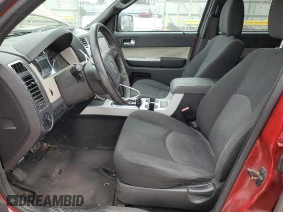 2010 Mercury Mariner with VIN 4M2CN8B75AKJ27950, listed as a Copart auction lot 44374895 with 173,236 mi miles and Salvage title. Bid and sale history available at DreamBid. Image 7.