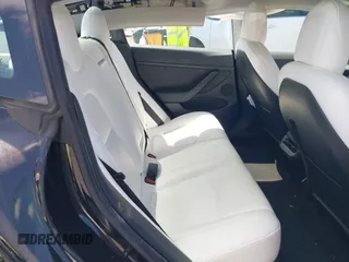 2022 Tesla Model 3 with VIN 5YJ3E1EA4NF316127, listed as a IAAI auction lot 41939191 with 30,857 mi miles. Bid and sale history available at carsss.com. Image 8.