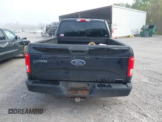 2015 Ford F-150 XL with VIN 1FTEX1CF2FKD12874, listed as a IAAI auction lot 41860610 with 242,215 mi miles. Bid and sale history available at carsss.com. Image 17.