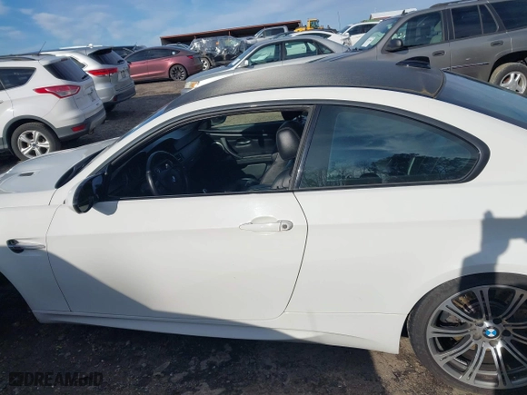 2013 BMW M3 with VIN WBSKG9C57DJ593607, listed as a IAAI auction lot 41586910 with 102,940 mi miles. Bid and sale history available at carsss.com. Image 14.