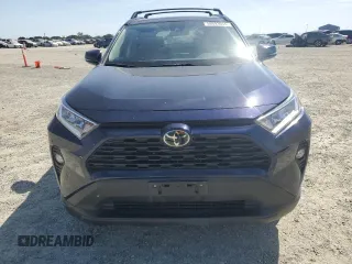 2020 Toyota RAV4 XLE with VIN 2T3W1RFV2LW074325, listed as a Copart auction lot 58693665 with 34,830 mi miles and Salvage title. Bid and sale history available at DreamBid. Image 5.
