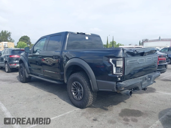2020 Ford F-150 Raptor with VIN 1FTFW1RG2LFA30858, listed as a IAAI auction lot 42192391 with 90,018 mi miles and . Bid and sale history available at carsss.com. Image 3.