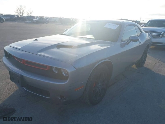 2018 Dodge Challenger GT with VIN 2C3CDZGG4JH255681, listed as a IAAI auction lot 41293951 with 106,164 mi miles. Bid and sale history available at carsss.com. Image 2.