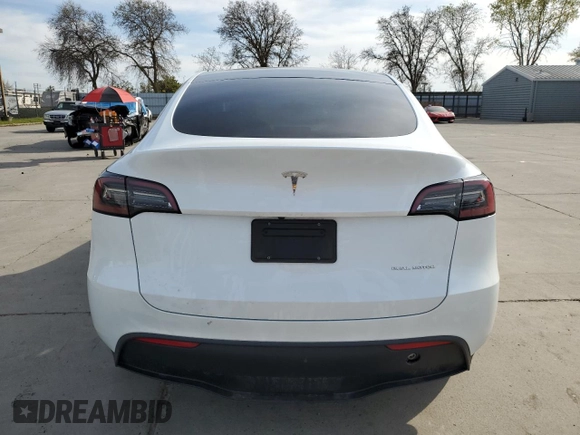 2023 Tesla Model Y Long Range z VIN 7SAYGDEE2PA065048, wystawiony jako Copart lot #48403655 z przebiegiem 56 553 mil mil oraz Szkoda całkowita • Salvage title. Historia ofert i sprzedaży dostępna na DreamBid. Obrazek 6.