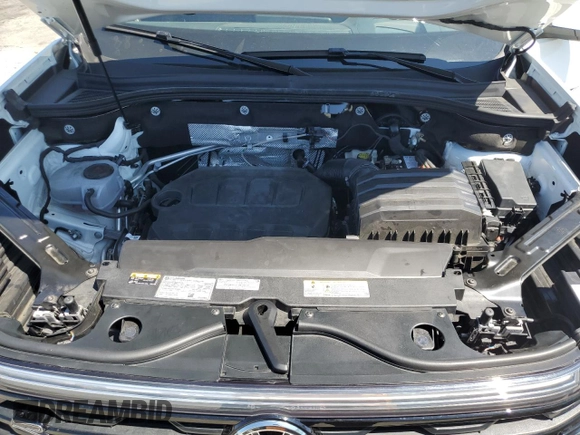 2024 Volkswagen Atlas SEL R-Line with VIN 1V2AE2CA5RC235798, listed as a Copart auction lot 64090595 with 1,310 mi miles and Salvage title. Bid and sale history available at DreamBid. Image 12.