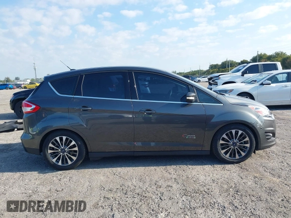 2017 Ford C-Max Energi Titanium with VIN 1FADP5FU9HL117693, listed as a IAAI auction lot 42059763 with 86,827 mi miles. Bid and sale history available at carsss.com. Image 14.