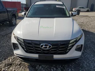 2023 Hyundai Tucson SEL with VIN 5NMJBCAE3PH255889, listed as a Copart auction lot 52285565 with 13,896 mi miles and Salvage Title. Bid and sale history available at carsss.com. Image 5.