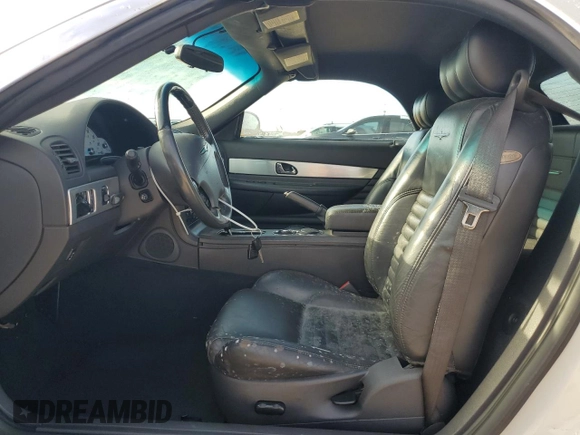 2002 Ford Thunderbird Hardtop Premium z VIN 1FAHP60A92Y103048, wystawiony jako Copart lot #73916924 z przebiegiem 75 396 mil mil oraz Szkoda całkowita • Salvage title. Historia ofert i sprzedaży dostępna na DreamBid. Obrazek 7.