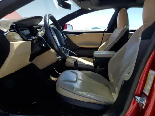 2014 Tesla Model S 60 with VIN 5YJSA1H17EFP64266, listed as a Copart auction lot 61678485 with 104,160 mi miles and Salvage title. Bid and sale history available at DreamBid. Image 7.