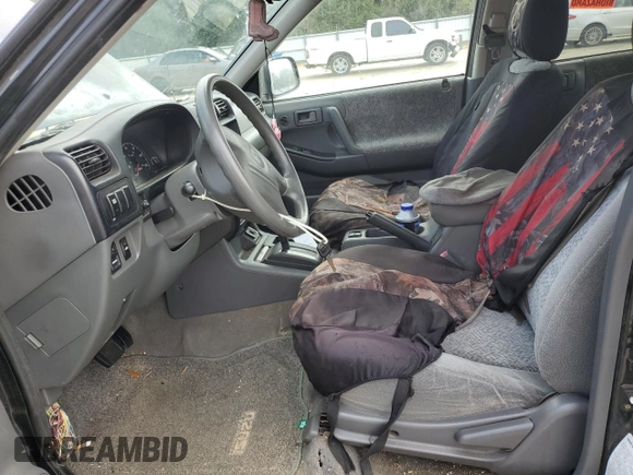 2001 Isuzu Rodeo S with VIN 4S2CK58W214338866, listed as a Copart auction lot 85280494 with 57,279 mi miles and Clean title. Bid and sale history available at DreamBid. Image 7.