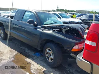 1999 Dodge Dakota SLT z VIN 1B7GL22Y1XS247515, wystawiony jako IAAI lot #42185138 z przebiegiem Nie podano mil oraz . Historia ofert i sprzedaży dostępna na DreamBid. Obrazek 1.