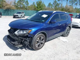 2017 Nissan Rogue SL with VIN JN8AT2MT6HW139347, listed as a IAAI auction lot 41771728 with 215,809 mi miles and . Bid and sale history available at DreamBid. Image 18.