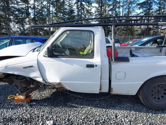 2000 Ford Ranger XL with VIN 1FTYR10C0YTB40536, listed as a IAAI auction lot 41132673 with 254,905 mi miles. Bid and sale history available at carsss.com. Image 13.
