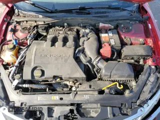 2012 Lincoln MKZ z VIN 3LNHL2GC7CR818220, wystawiony jako Copart lot #63058095 z przebiegiem 192 896 mil mil oraz Szkoda całkowita • Salvage title. Historia ofert i sprzedaży dostępna na DreamBid. Obrazek 11.