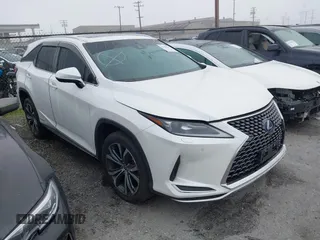 2022 Lexus RX with VIN JTJHGKFA6N2027366, listed as a IAAI auction lot 41193809 with 110,528 mi miles. Bid and sale history available at carsss.com. Image 1.