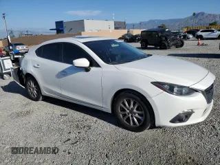 2015 Mazda 3 i Touring with VIN JM1BM1V70F1265495, listed as a Copart auction lot 52867345 with 154,496 mi miles and Salvage Title. Bid and sale history available at DreamBid. Image 4.