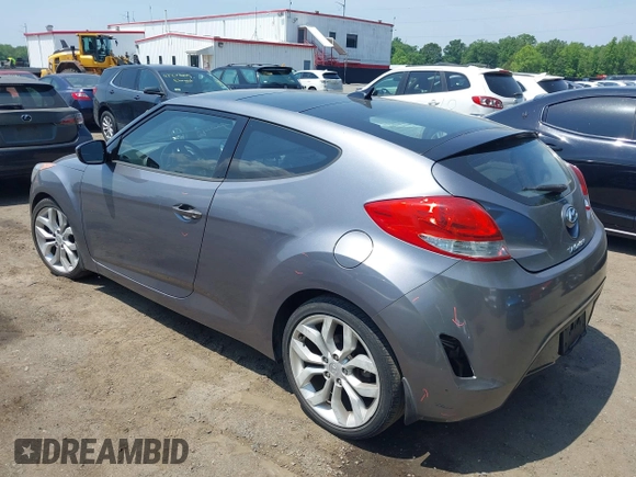 2013 Hyundai Veloster w/Gray Int with VIN KMHTC6AD5DU132237, listed as a IAAI auction lot 42268005 with 84,646 mi miles and . Bid and sale history available at DreamBid. Image 3.