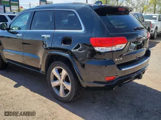 2014 Jeep Grand Cherokee Overland with VIN 1C4RJFCT7EC187319, listed as a Copart auction lot 52506115 with 98,314 mi miles and Clean Title. Bid and sale history available at carsss.com. Image 3.