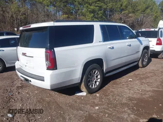 2016 GMC Yukon XL SLE with VIN 1GKS2FKC6GR458066, listed as a IAAI auction lot 41252794 with 168,606 mi miles. Bid and sale history available at carsss.com. Image 4.