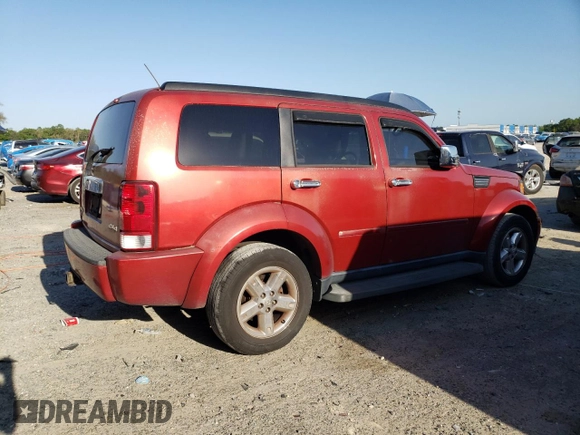 2007 Dodge Nitro SLT z VIN 1D8GU58KX7W569839, wystawiony jako Copart lot #53720705 z przebiegiem 175 746 mil mil oraz Czysty tytuł • Clean title. Historia ofert i sprzedaży dostępna na DreamBid. Obrazek 3.