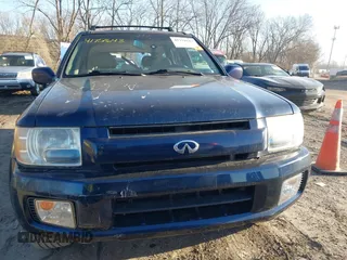2002 Infiniti QX4 Luxury z VIN JNRDR09Y52W252374, wystawiony jako IAAI lot #41751643 z przebiegiem 183 000 mil mil oraz . Historia ofert i sprzedaży dostępna na DreamBid. Obrazek 13.