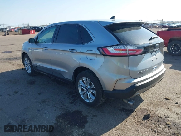 2022 Ford Edge Titanium z VIN 2FMPK4K95NBA33637, wystawiony jako IAAI lot #42074777 z przebiegiem 58 733 mil mil oraz . Historia ofert i sprzedaży dostępna na DreamBid. Obrazek 3.
