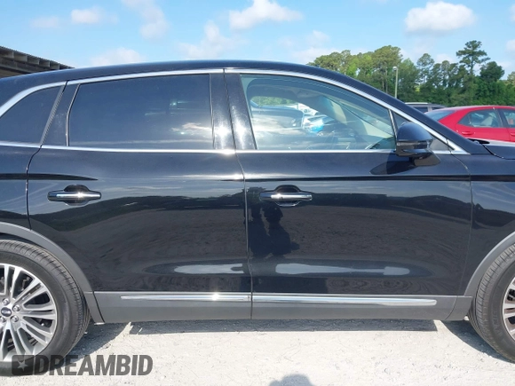 2016 Lincoln MKX Reserve with VIN 2LMTJ6LP9GBL27835, listed as a IAAI auction lot 42175905 with 87,541 mi miles. Bid and sale history available at carsss.com. Image 13.