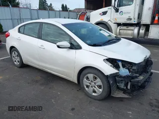 2015 Kia Forte LX with VIN KNAFX4A64F5429778, listed as a IAAI auction lot 41732846 with 167,253 mi miles. Bid and sale history available at carsss.com. Image 1.
