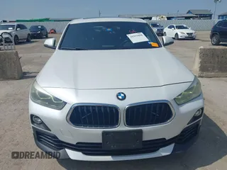 2018 BMW X2 sDrive28i z VIN WBXYJ3C39JEJ82408, wystawiony jako IAAI lot #41919498 z przebiegiem 121 403 mil mil oraz . Historia ofert i sprzedaży dostępna na DreamBid. Obrazek 10.