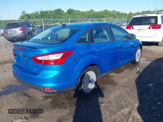 2012 Ford Focus SE with VIN 1FAHP3F2XCL327992, listed as a IAAI auction lot 42305746 with 65,229 mi miles and . Bid and sale history available at DreamBid. Image 4.