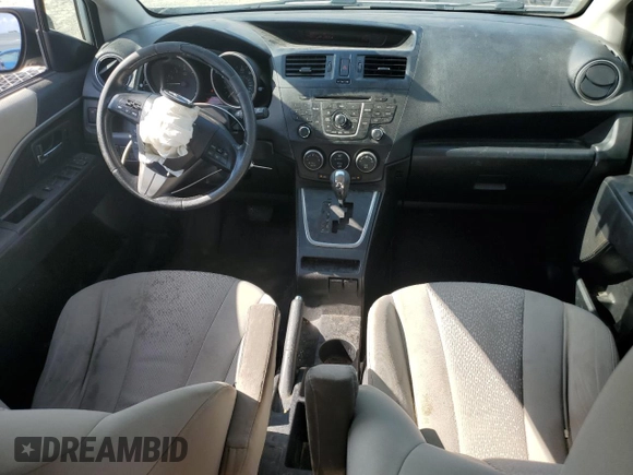2012 Mazda 5 Touring with VIN JM1CW2CL1C0111528, listed as a Copart auction lot 57982005 with 168,480 mi miles and Salvage title. Bid and sale history available at DreamBid. Image 8.
