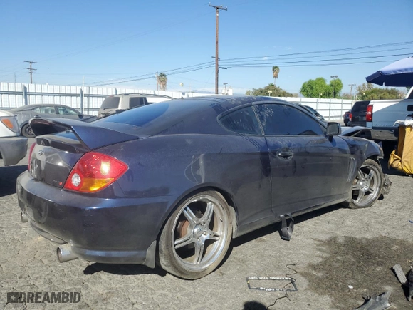 2004 Hyundai Tiburon GT with VIN KMHHN65FX4U108253, listed as a Copart auction lot 77635034 with 34,170 mi miles and Salvage Title. Bid and sale history available at carsss.com. Image 3.